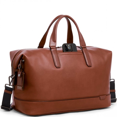 Travel bag Tumi (USA) made of genuine leather.