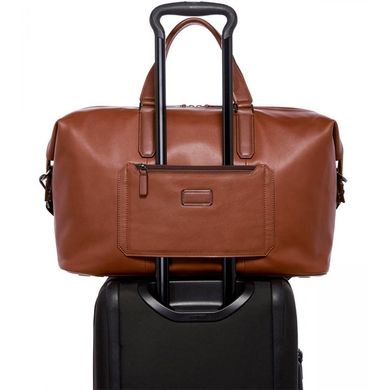 Travel bag Tumi (USA) made of genuine leather.