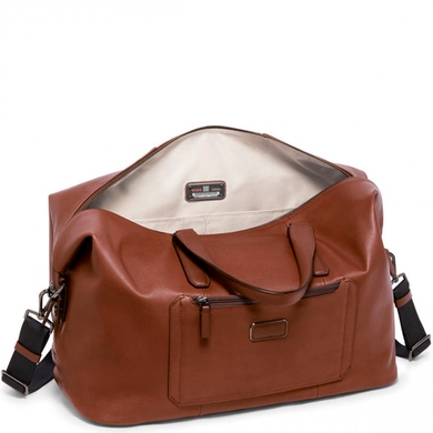 Travel bag Tumi (USA) made of genuine leather.