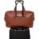 Travel bag Tumi (USA) made of genuine leather.