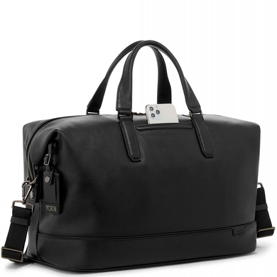 Travel bag Tumi (USA) made of genuine leather.