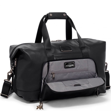 Travel bag Tumi (USA) made of genuine leather.