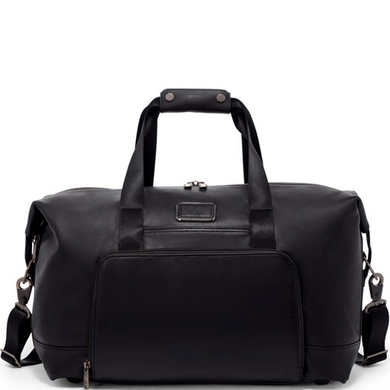 Travel bag Tumi (USA) made of genuine leather.