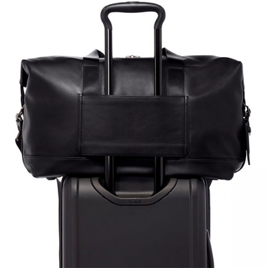 Travel bag Tumi (USA) made of genuine leather.