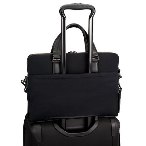 Briefcase by Tumi (USA) made of genuine leather. Article: 066000D